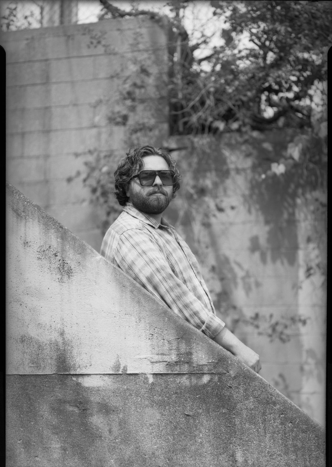 Leo in front of a brick wall